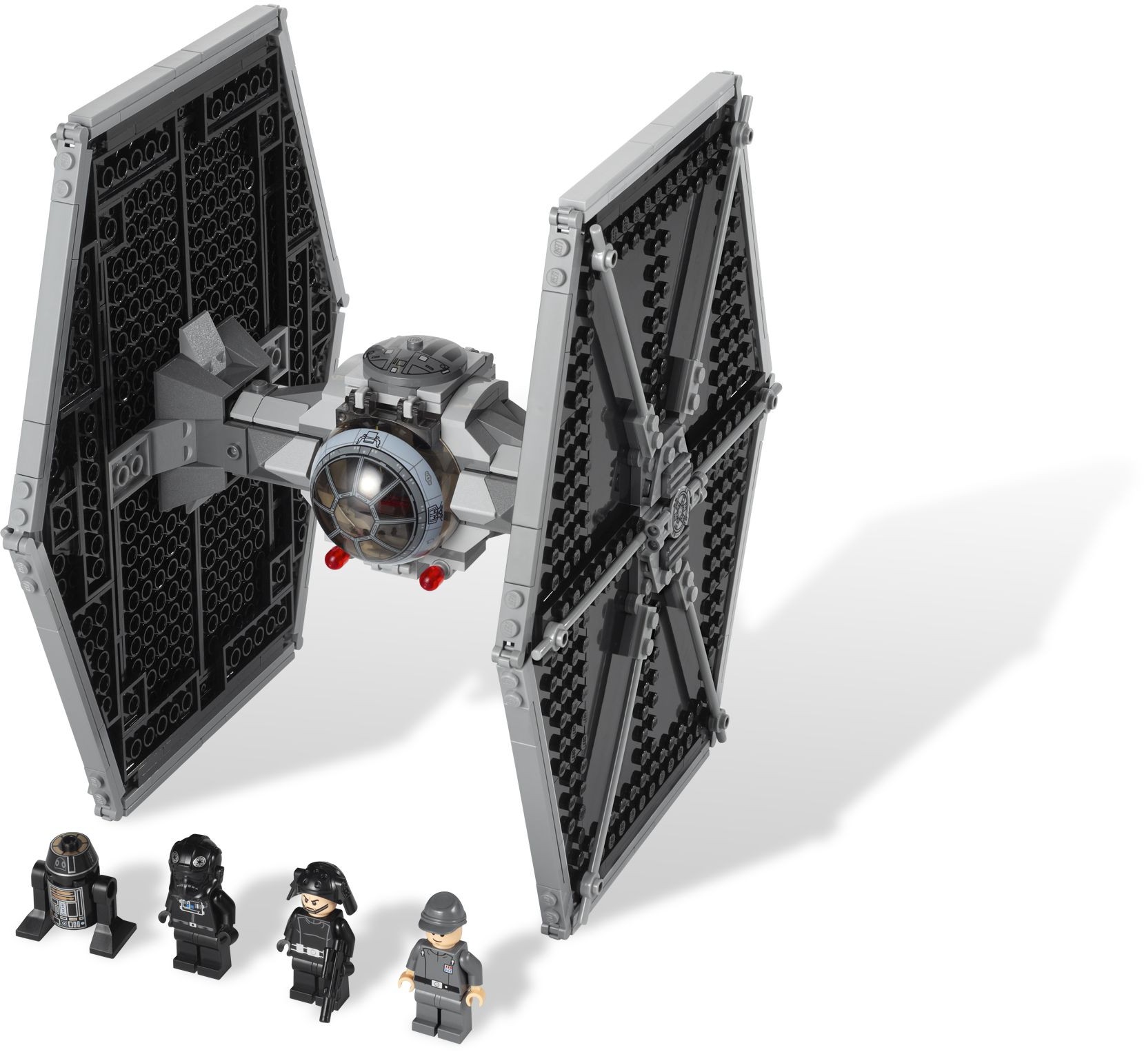 The grey-and-black TIE Fighter with four LEGO minifigures